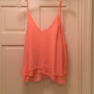 Beautiful, light peach colored tank for going out